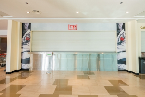 UFC Apex Stage B with cameras, a desk, and both black and green screens