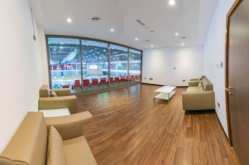 UFC Apex Stage B with cameras, a desk, and both black and green screens